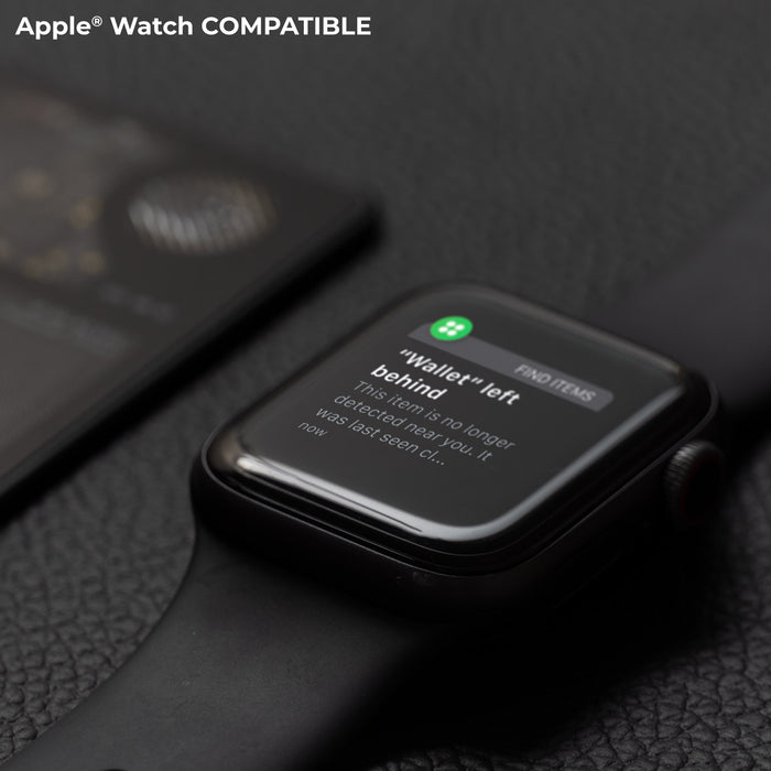 AirCard™ - Card-sized wallet tracker - 1x AirCard - Black smartwatch displaying alert notification for wallet left behind on black leather surface. - Rolling Square