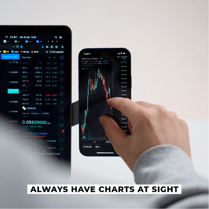 EDGE® Full Kit - Productivity magnetic kit - Carrara White - Hand using black smartphone displaying financial charts and data next to tablet with similar chart interface. - Rolling Square