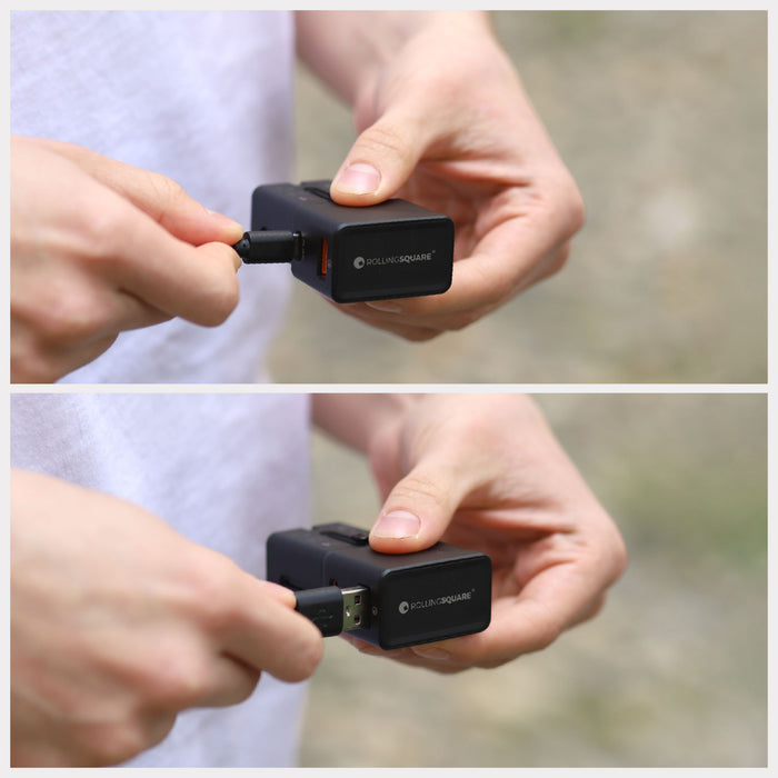 Pocket Travel Charger - US/EU/UK/AU plugs - 30W - 1 Port - Compact black travel charger with interchangeable US/EU/UK/AU plugs held in hand. - Rolling Square