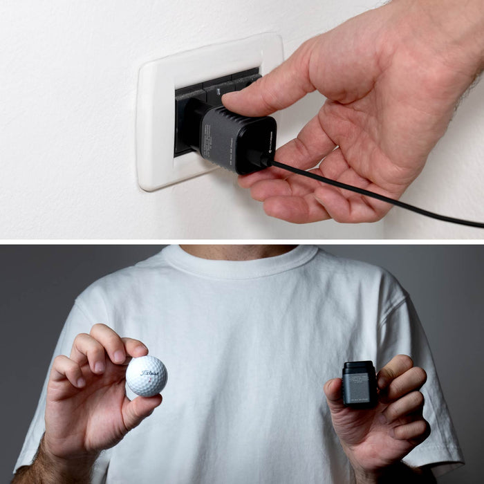 Supertiny 65W + Free 2in1 Cable (Bundle) - US - Compact black 65W charger plugged into white wall outlet with hand holding plug, and person in white shirt holding charger. - Rolling Square
