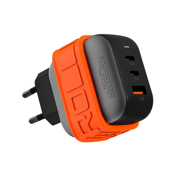 Essential GaN Charger - 65W power, 45% smaller - US - Black and orange 65W GaN charger with three USB ports and EU plug. - Rolling Square