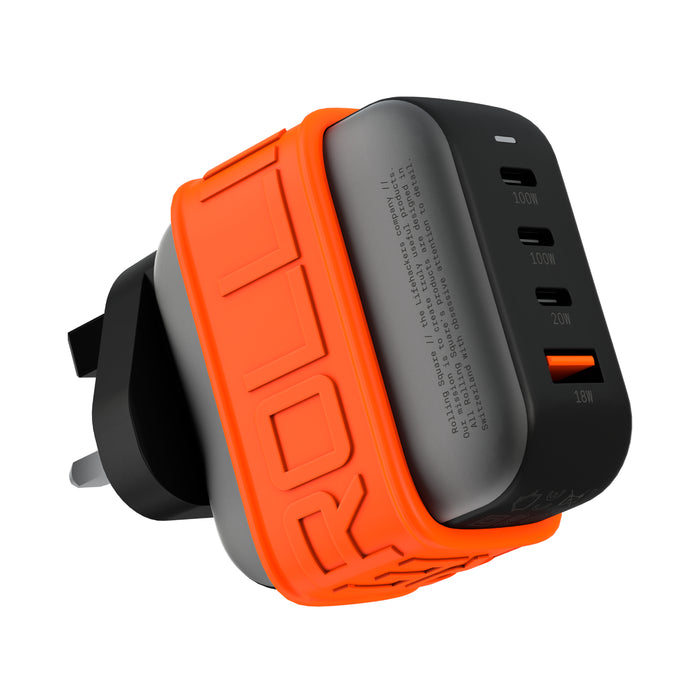 Essential GaN Charger - 100W power, 45% smaller - US - Compact black GaN charger with three USB-C ports and one orange USB-A port, EU plug, orange silicone protective sleeve. - Rolling Square
