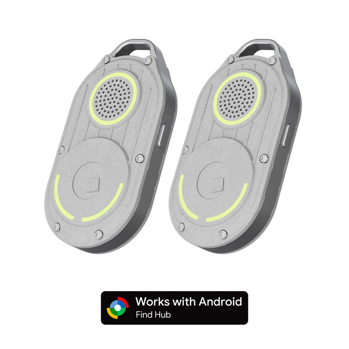 AirNotch™ Pro - Android & Apple Bluetooth tracker - Black - Apple Network - Two gray AirNotch Pro Bluetooth trackers with circular speaker grills and LED indicator rings above and below the button. - Rolling Square