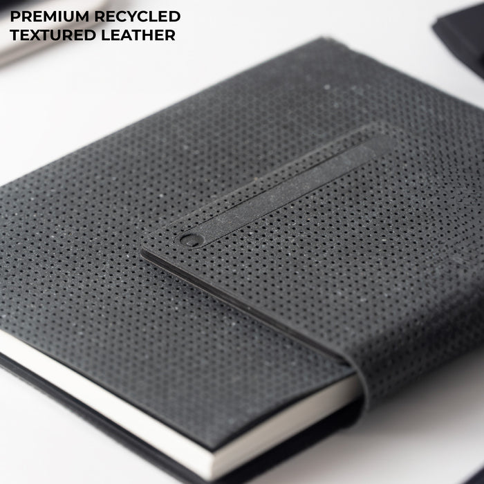 AirCard™ Notebook - A5 notebook made for AirCard - Grainy Black - A5 notebook with grainy black recycled textured leather cover and elastic closure band. - Rolling Square