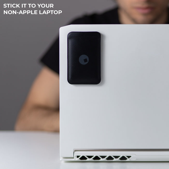 AirCard™ Pouch - Attach AirCard anywhere - Black - Black AirCard™ pouch attached to the back corner of a white laptop. - Rolling Square